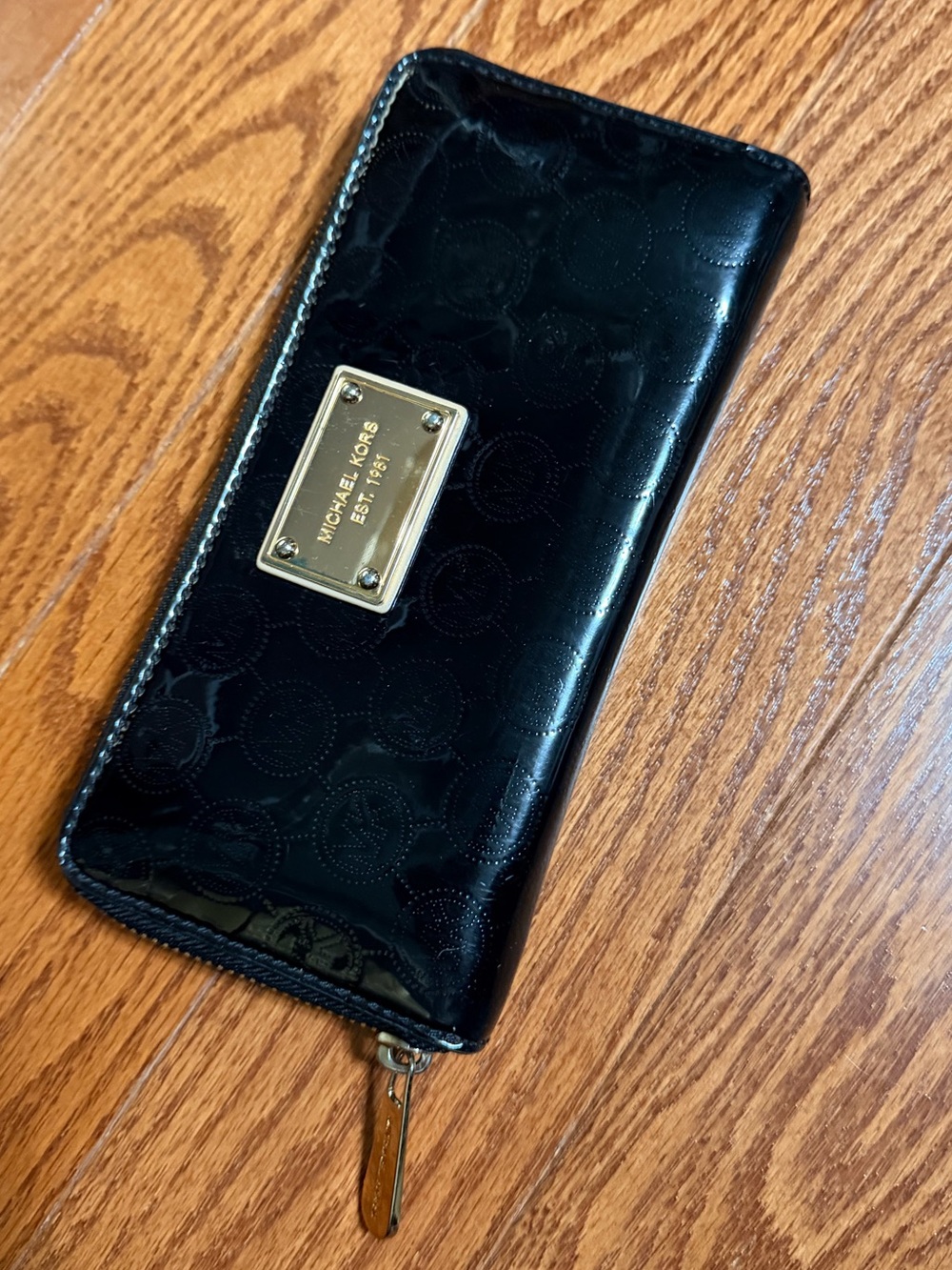 Michael Kors Black Patent Zip-Around Wallet with Gold Plate